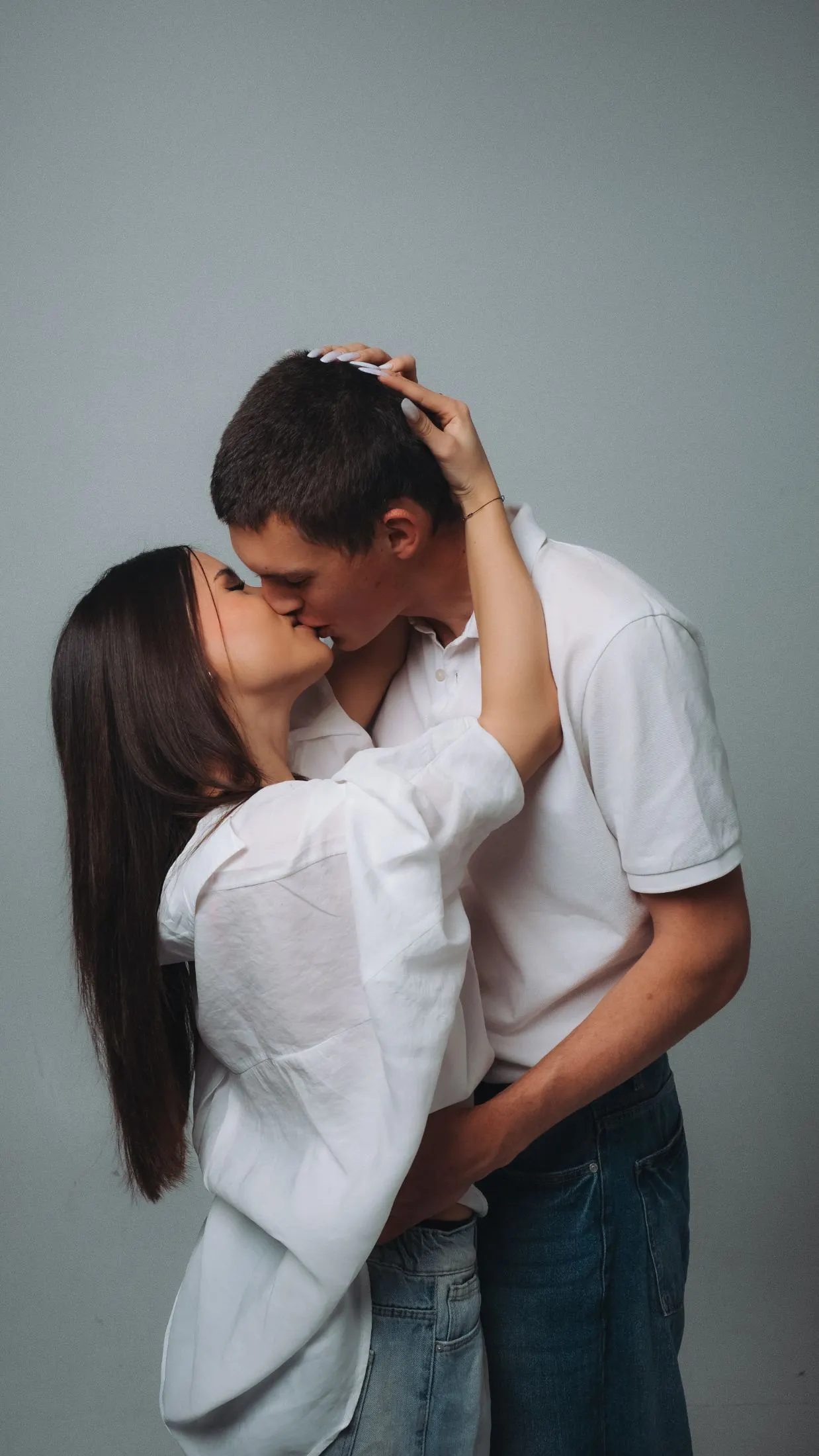 Couple photographed together in a relaxed studio portrait